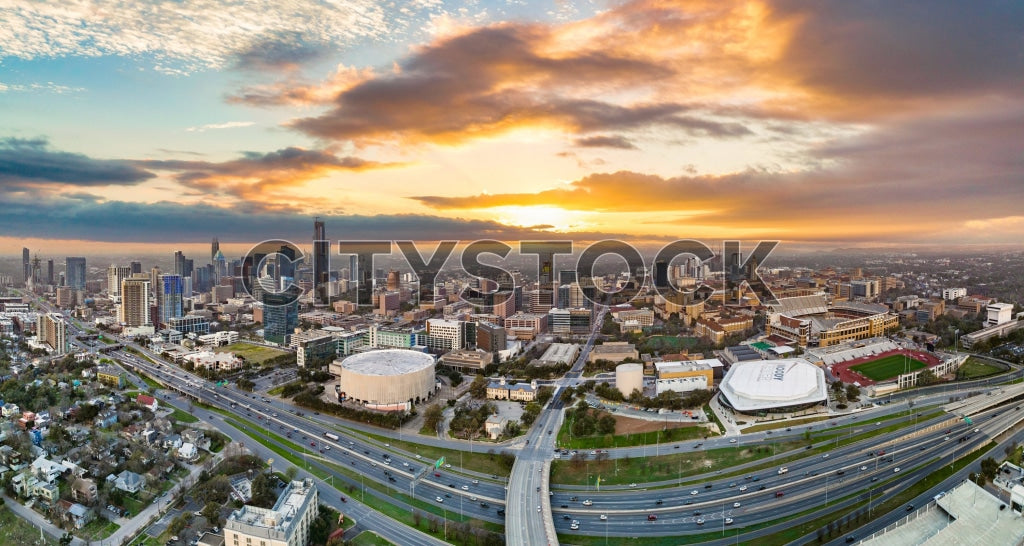 Aerial view of Austin skyline during sunset with vivid clouds