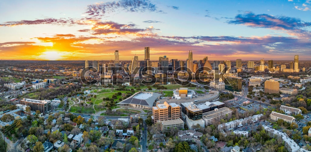 Aerial view of Austin skyline with dramatic sunset