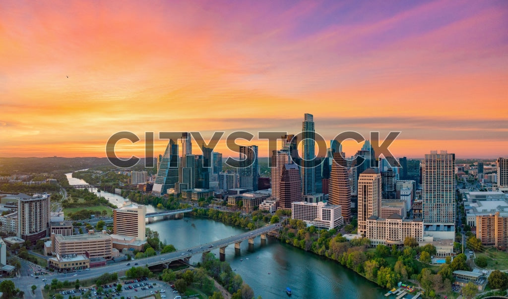 Aerial view of Austin skyline at sunrise with the Colorado River