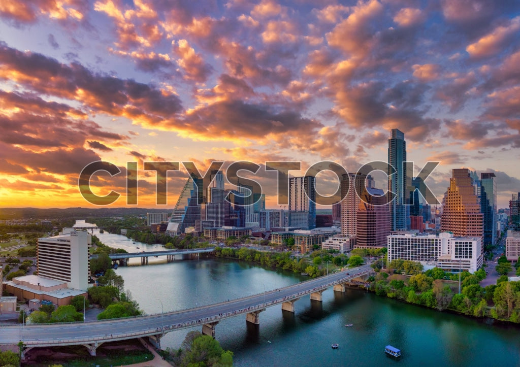 Sunset over Austin skyline and Colorado River, vibrant city view