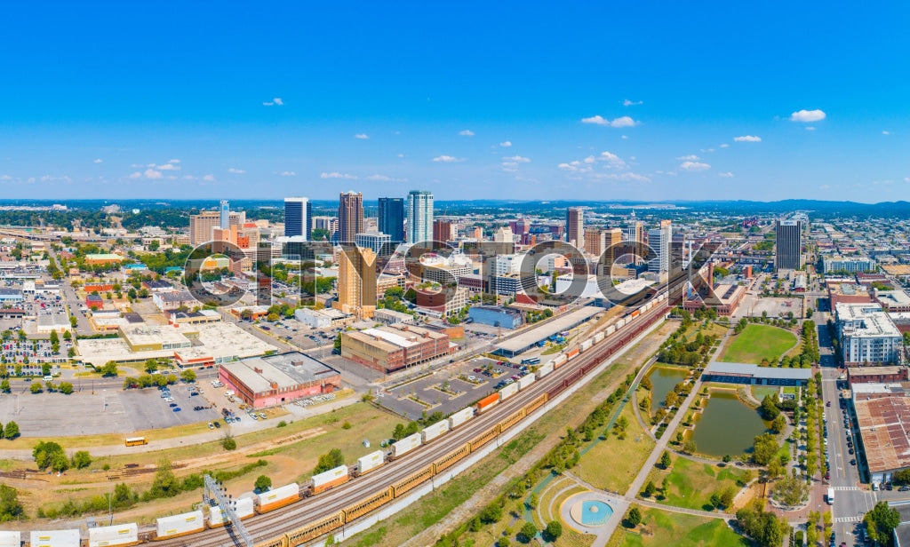 Aerial view of Birmingham, Alabama showcasing its skyline and urban layout under a clear blue sky