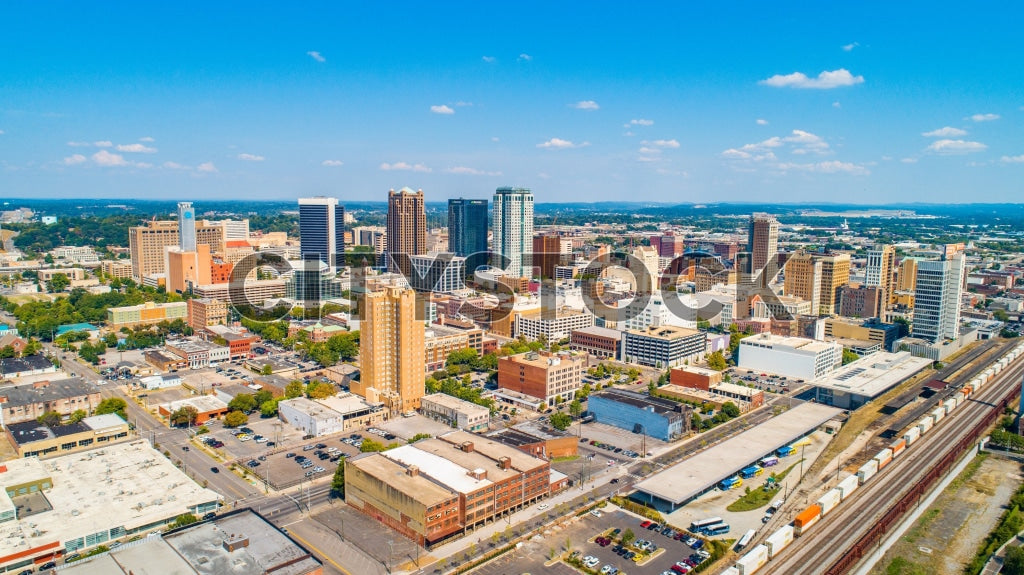 Aerial view of Birmingham Alabama cityscape under clear skies