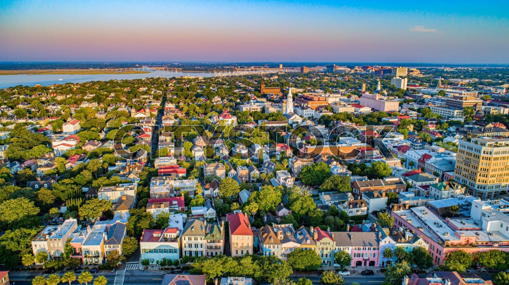 Aerial view of Charleston, SC cityscape at sunset highlighting historical sites