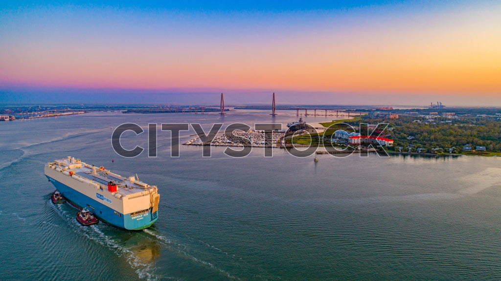 Aerial view of cargo ship at sunrise in Charleston Harbor, SC