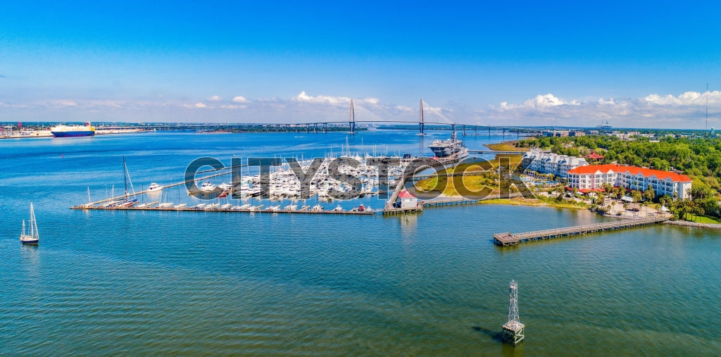 Aerial view of Charleston Harbor with boats and bridge