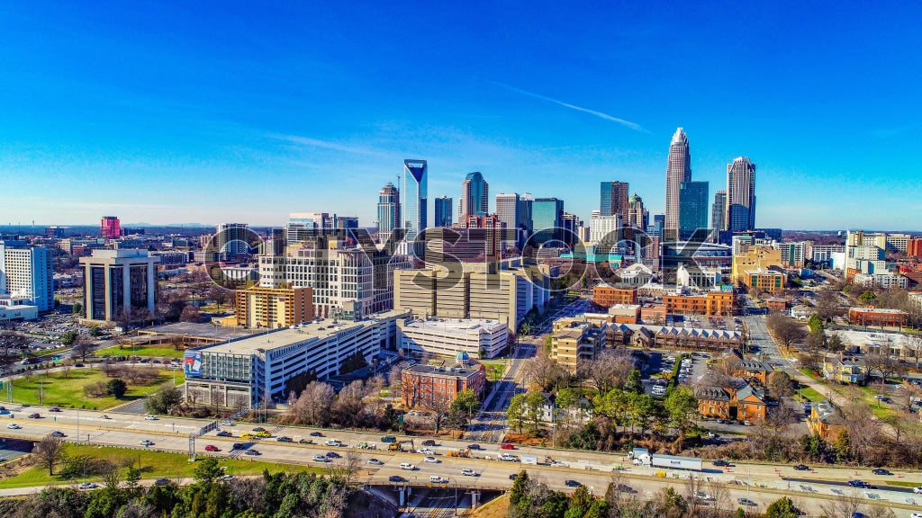 Aerial shot of Charlotte, North Carolina cityscape on sunny day