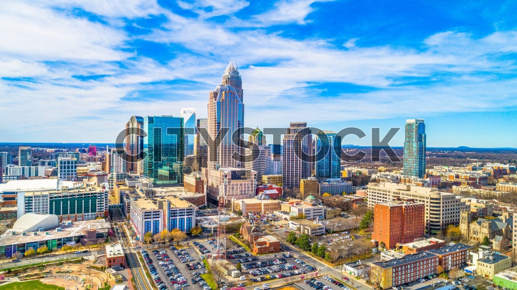 Aerial view of Charlotte, NC, with skyscrapers and blue sky