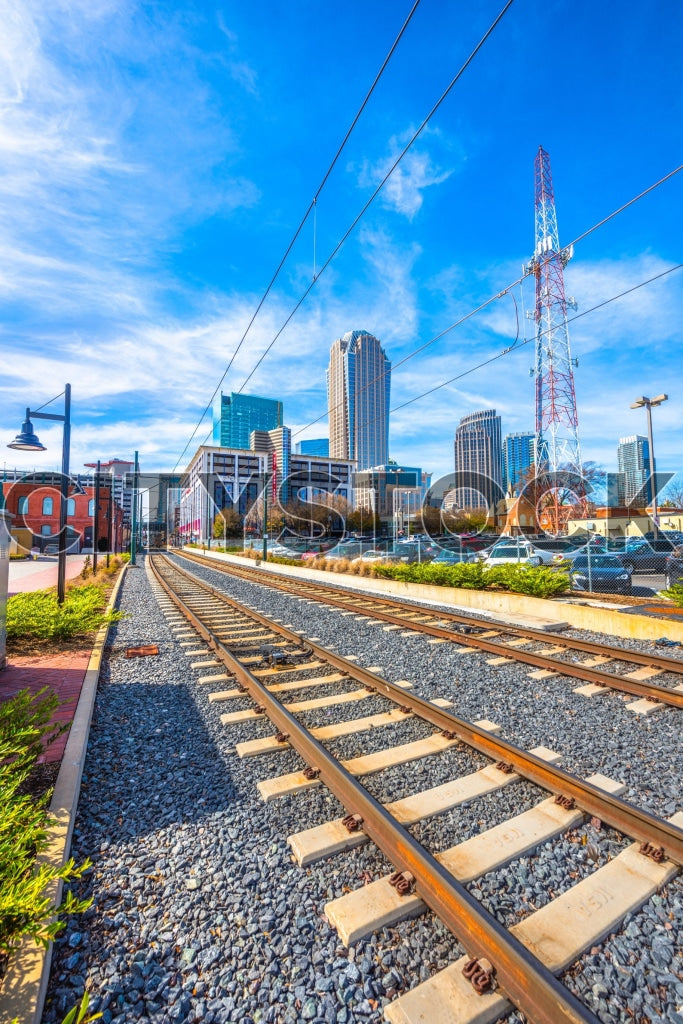 Modern architecture of Charlotte NC skyline over railway tracks