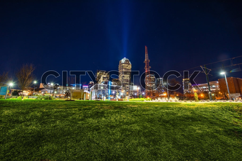 Night view of Charlotte NC skyline with bright city lights
