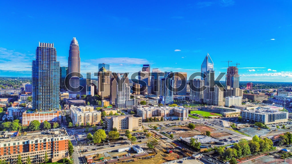 Charlotte NC skyline, Bank of America and Duke Energy Centers under clear blue sky