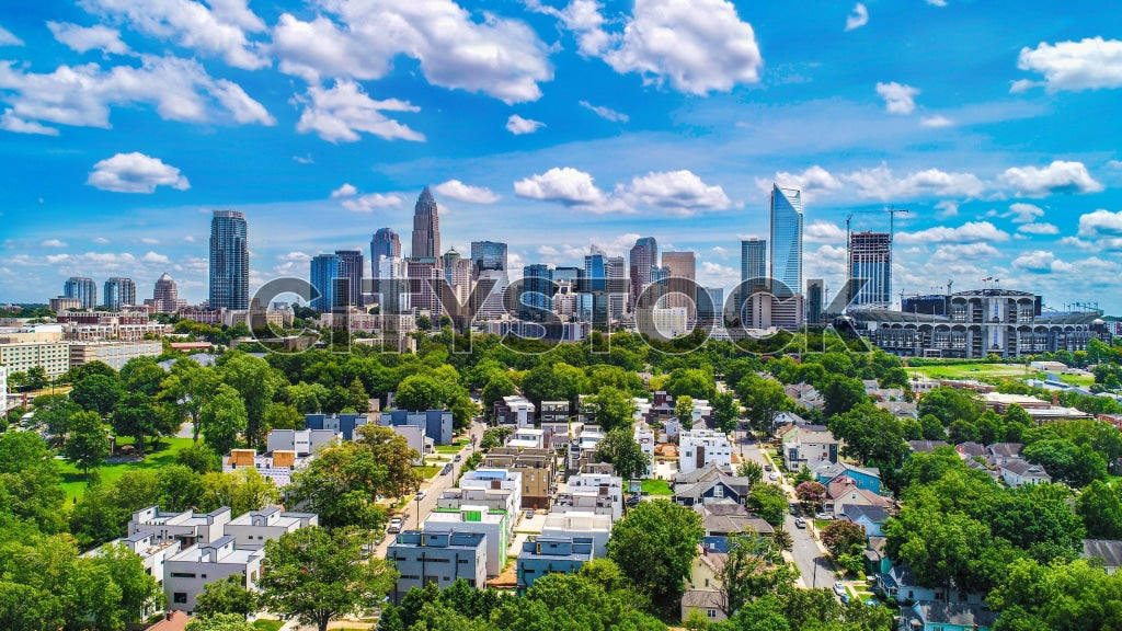 Aerial view of Charlotte, NC skyline with residential areas