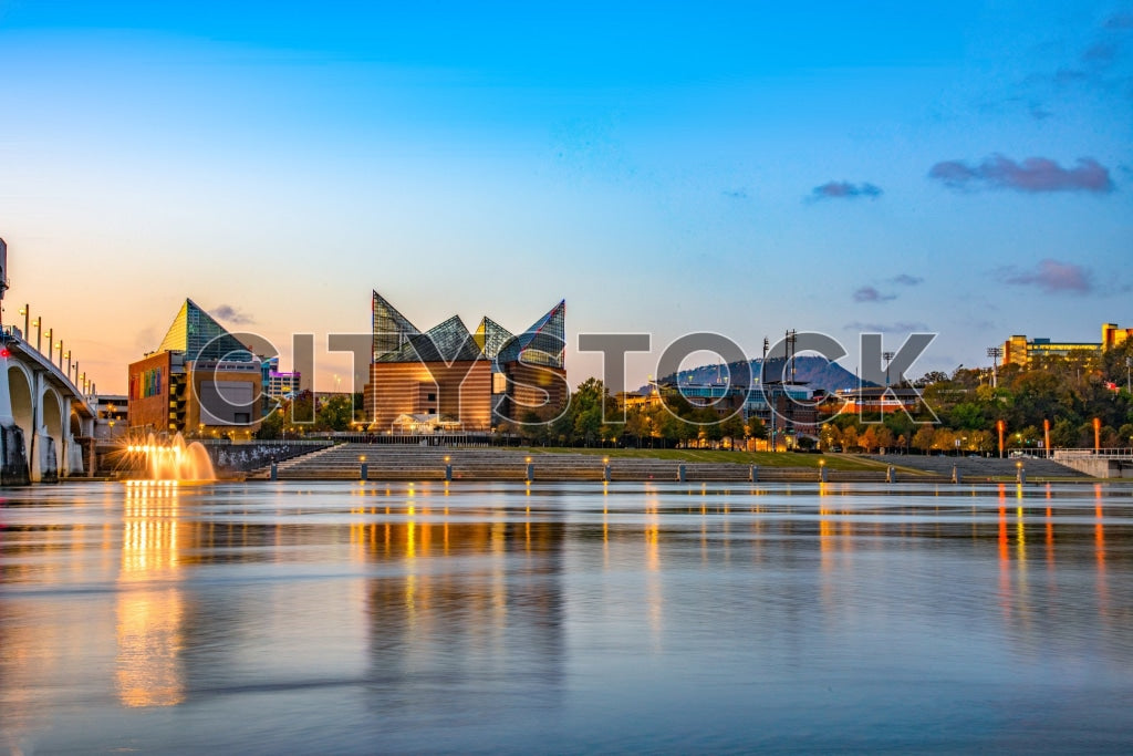 Chattanooga city skyline at sunrise with Tennessee River reflections
