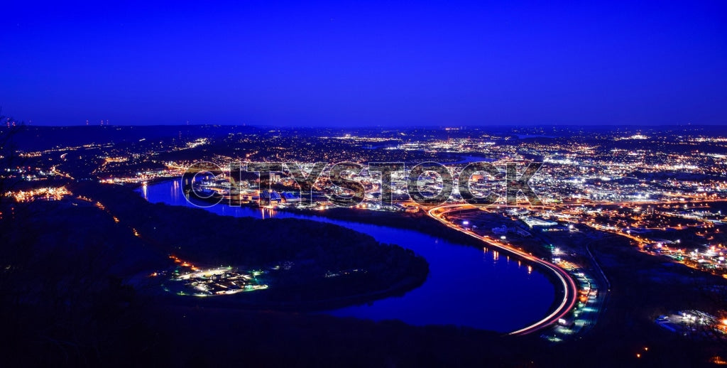 Aerial view of Chattanooga city lights and Tennessee River at night