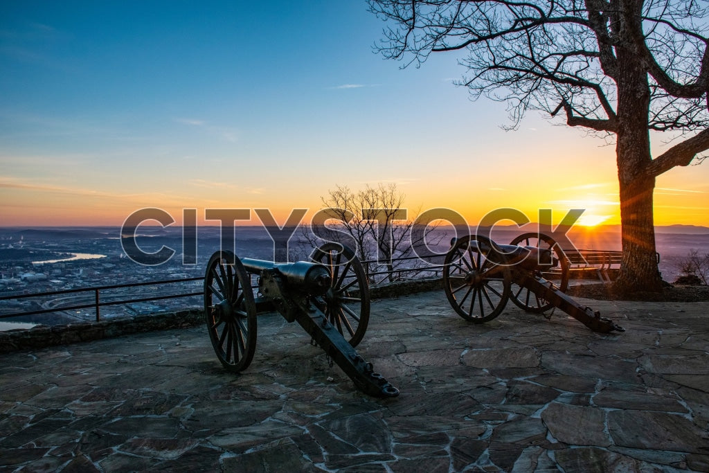 Historic cannons at sunrise overlooking Chattanooga city