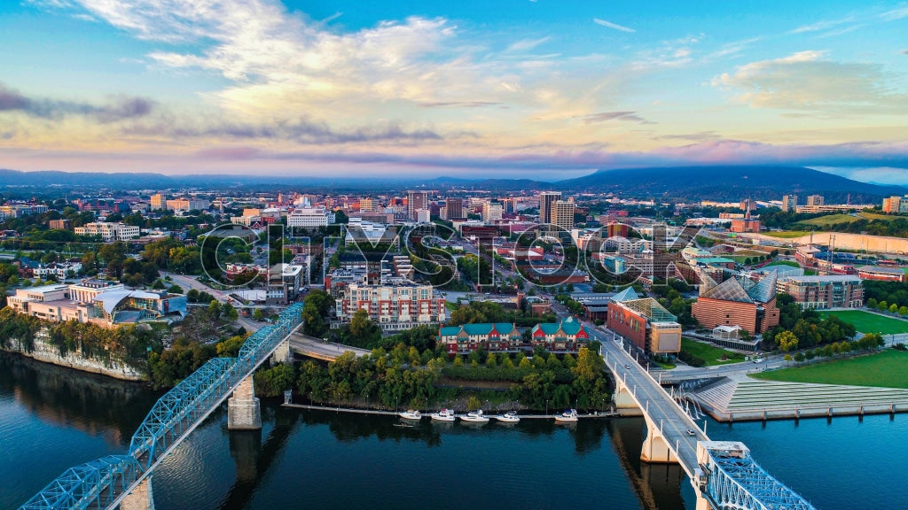 Aerial view of Chattanooga cityscape by the river at sunrise