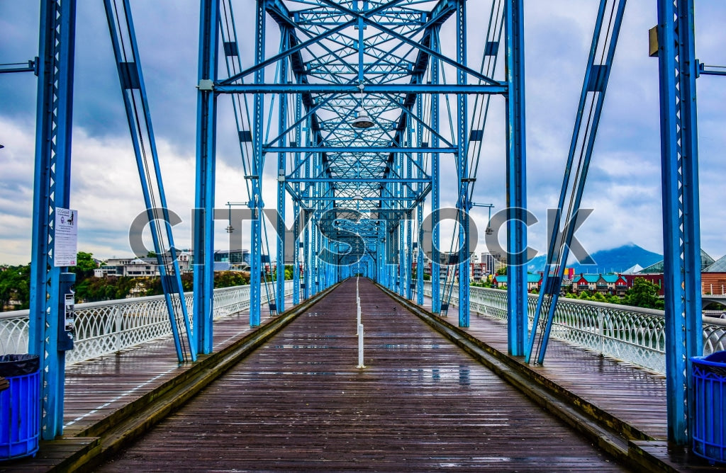 Historic blue bridge in Chattanooga on a rainy day