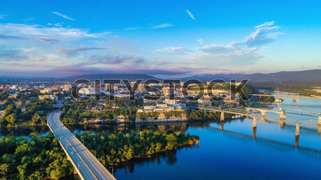 Aerial view of Chattanooga at sunrise, showcasing bridges and cityscape