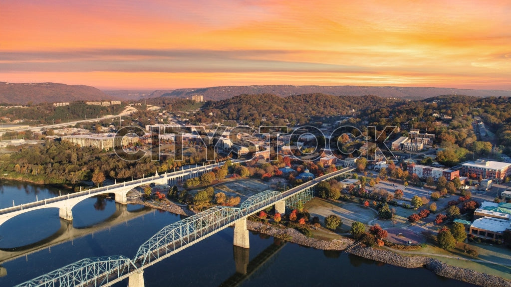 Aerial view of sunset over Chattanooga, Tennessee with river and bridges