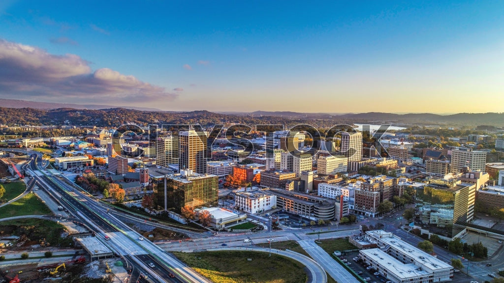 Aerial view of downtown Chattanooga at sunrise with city lights