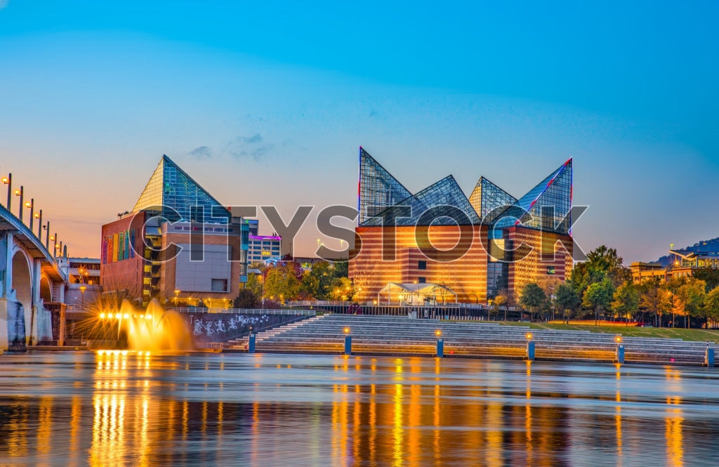 Chattanooga riverfront at sunset with pyramid-like buildings