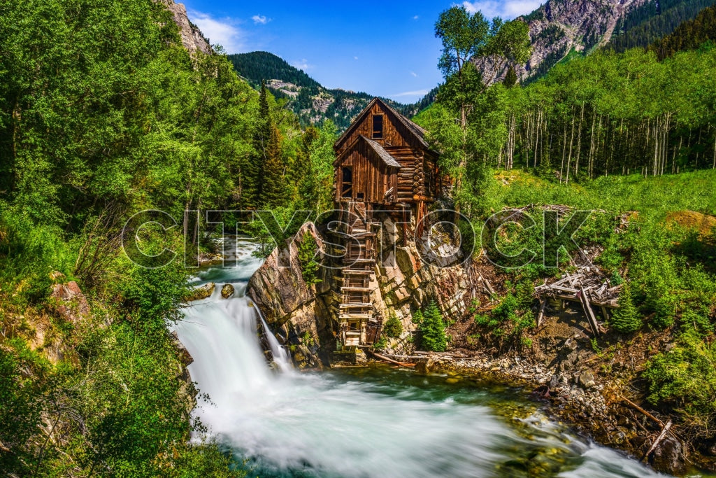 Historic Crystal Mill with a cascading waterfall in Colorado