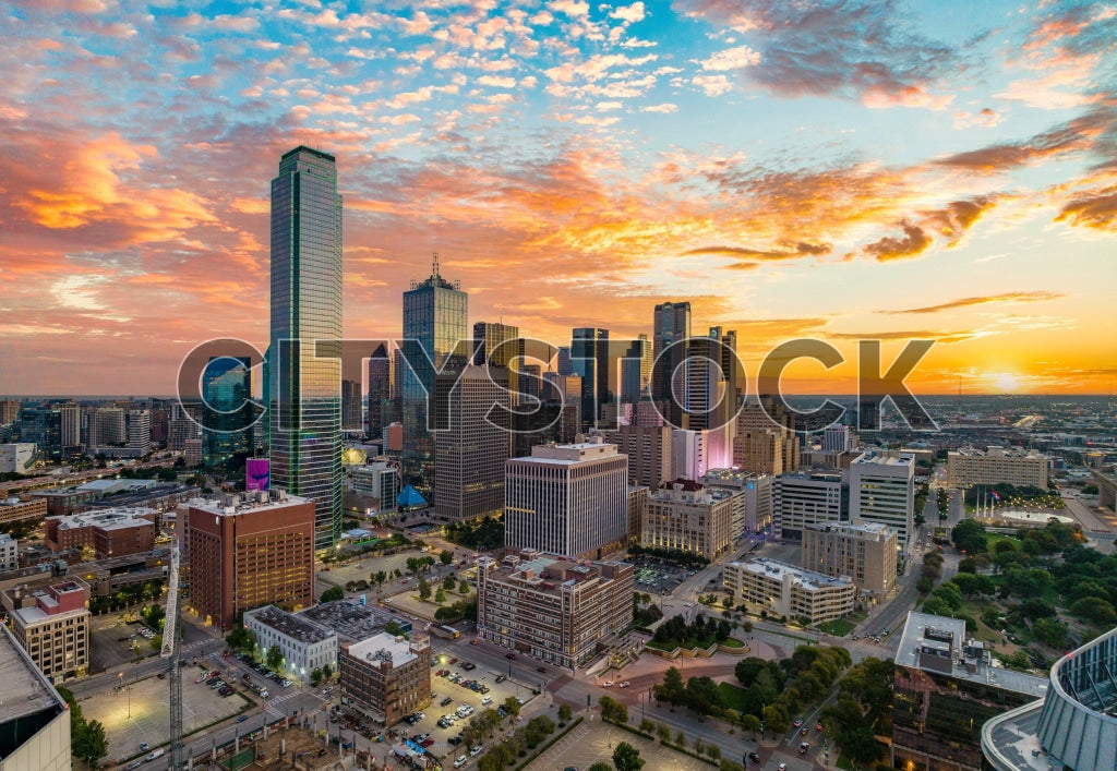 Dramatic aerial view of Dallas skyline during sunset