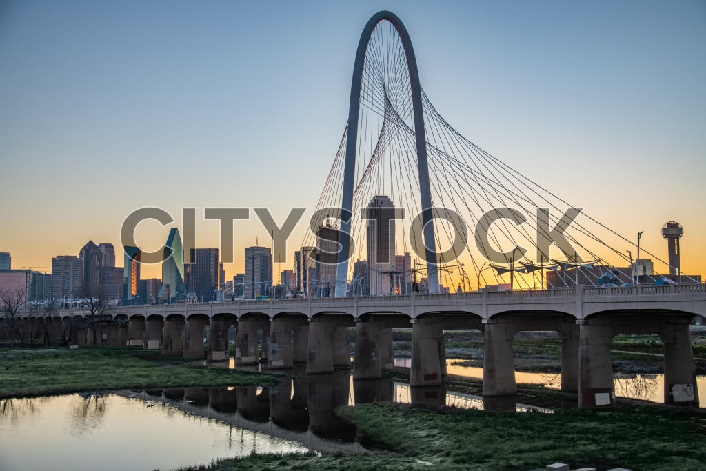 Sunset over Margaret Hunt Hill Bridge with Dallas skyline