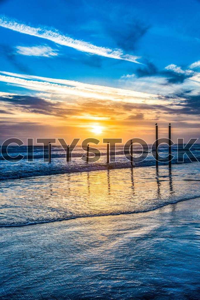 Stunning Daytona Beach sunrise with vivid ocean waves and blue sky