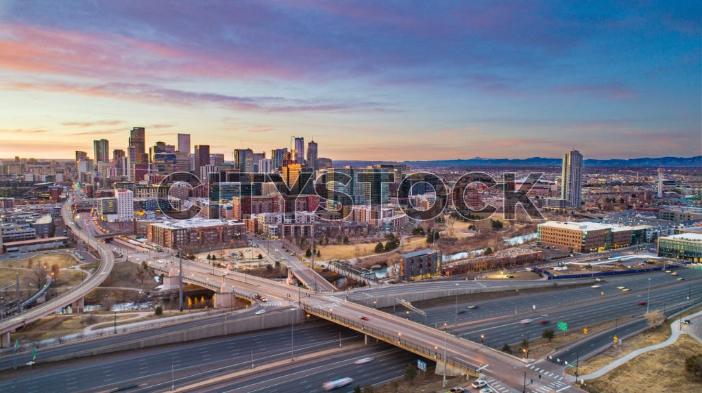 Aerial View of Denver Skyline at Sunset with Colorful Sky