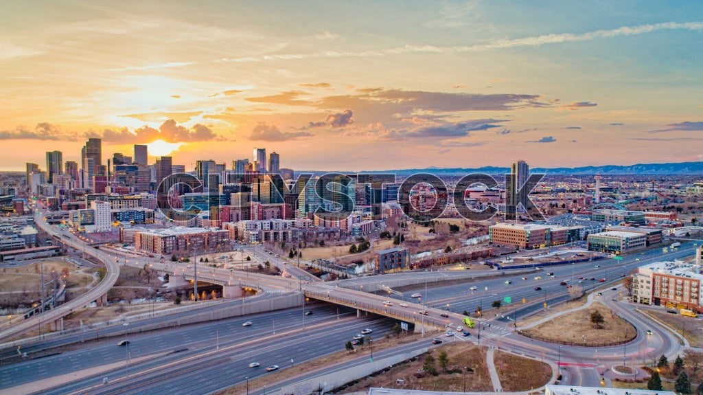 Aerial view of Denver skyline with sunset illumination