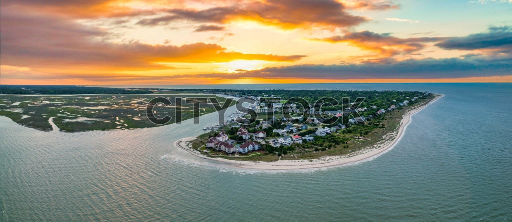 Aerial view of sunset over Edisto Island, South Carolina, showing beaches and homes.