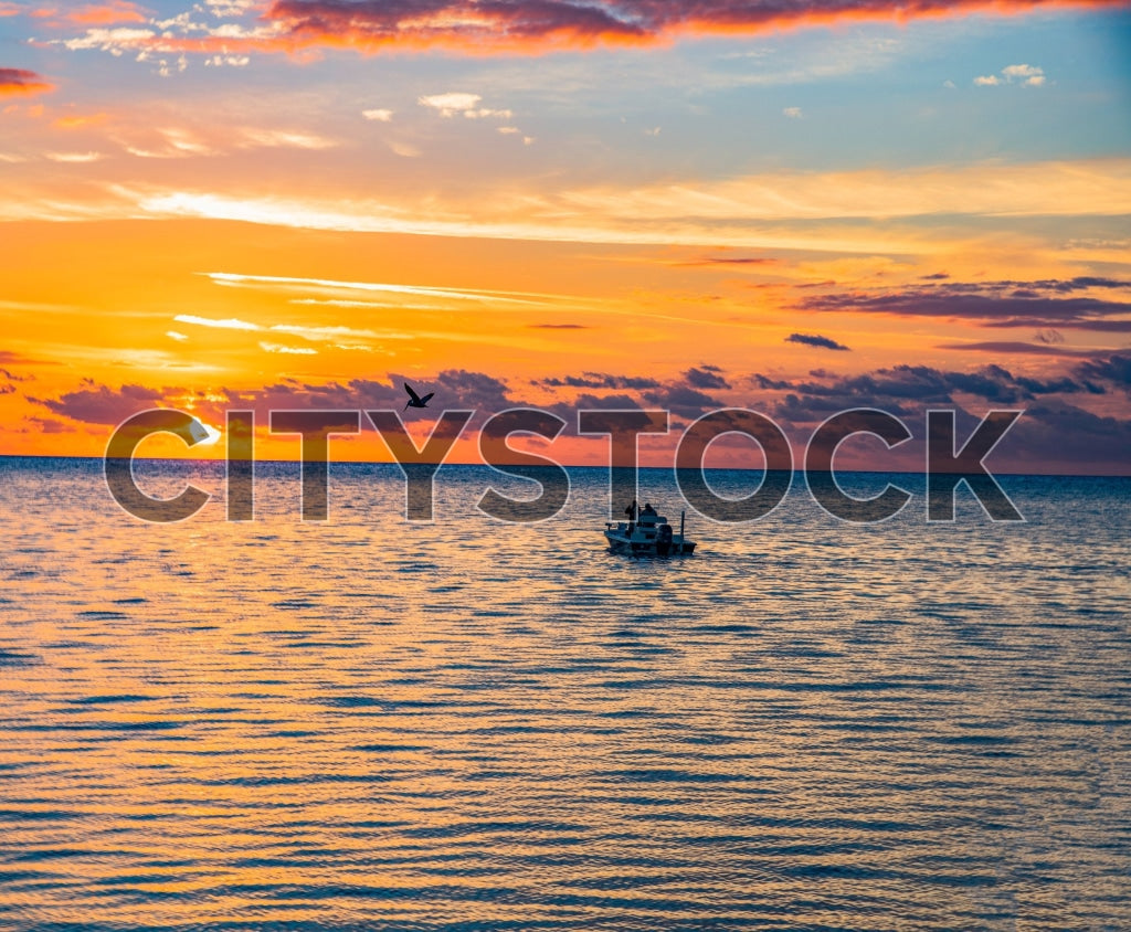 Florida Keys sunset with fishing boat and colorful sky