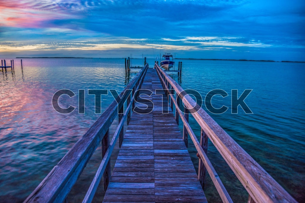 Serene sunset at Florida Keys wooden dock with vivid ocean colors