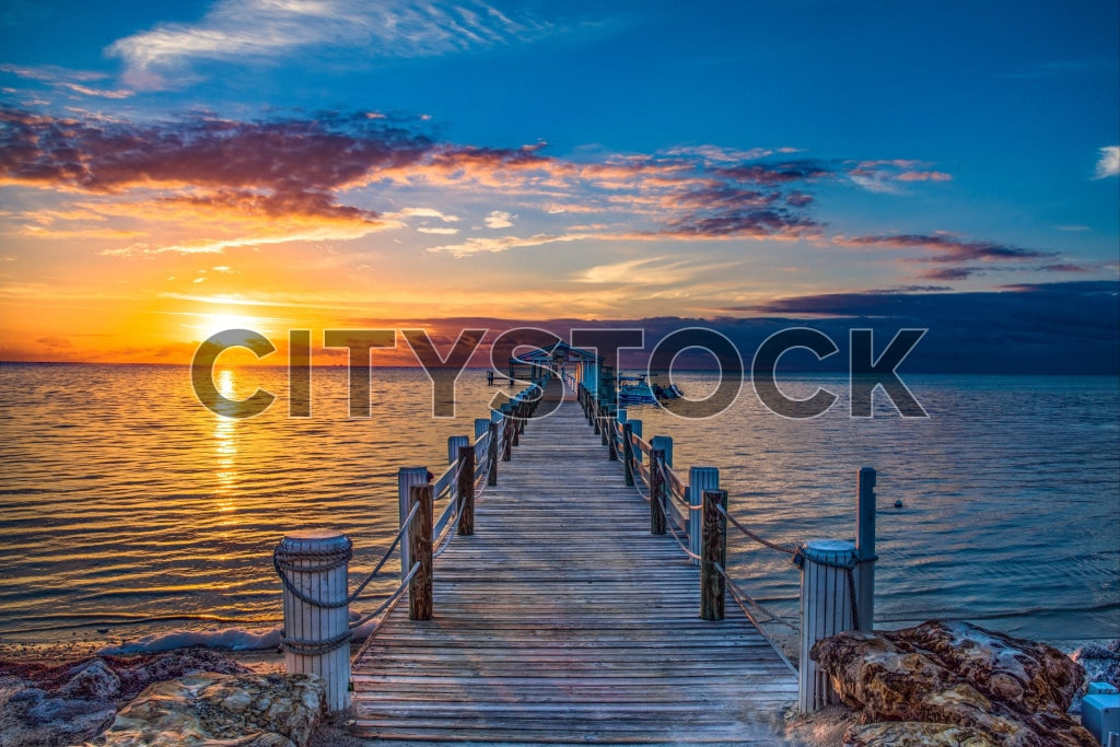 Stunning sunset view at Florida Keys with wooden pier and tranquil waters