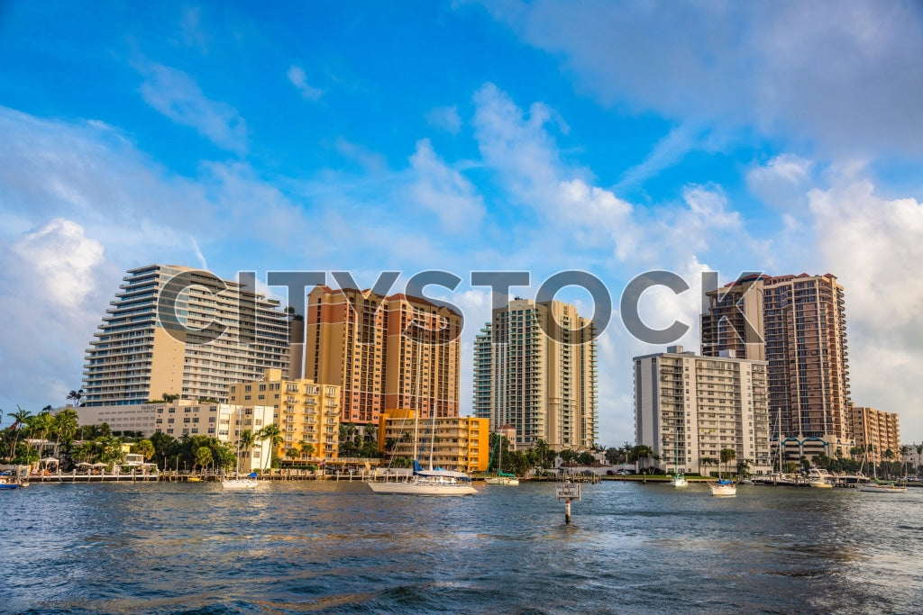 Fort Lauderdale cityscape with high-rises and boats on waterfront