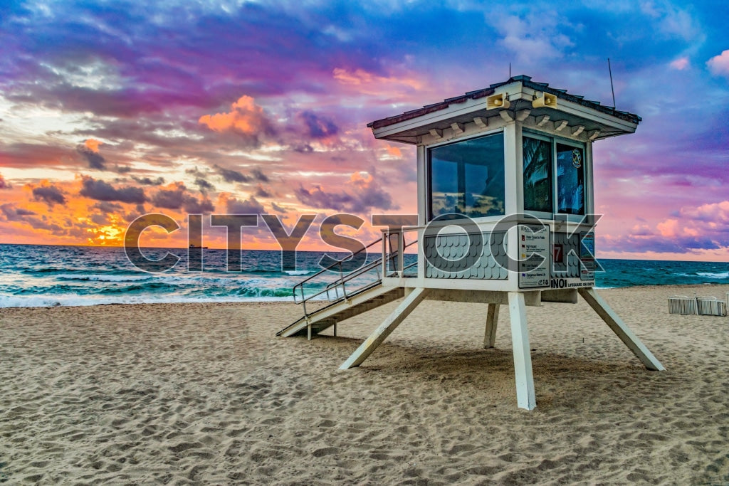 Dramatic sunrise over a picturesque lifeguard hut in Fort Lauderdale