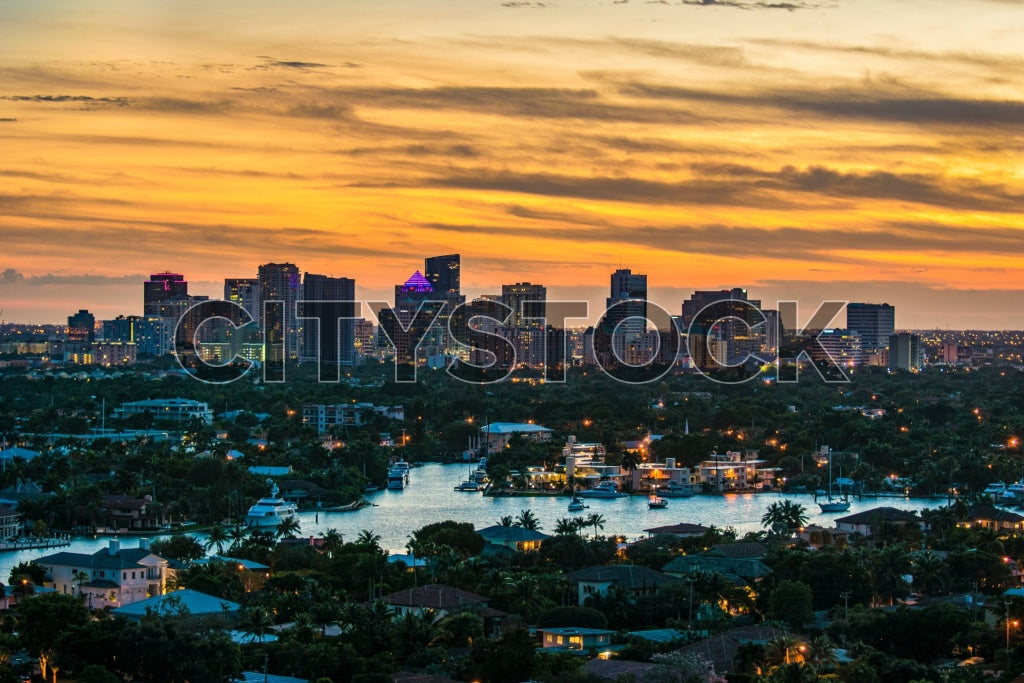 Fort Lauderdale skyline and waterways glowing at sunset