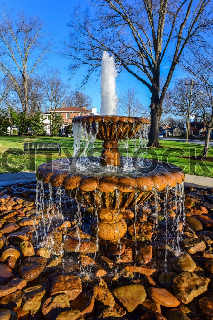 Energetic stone fountain amidst nature in Gaffney Park