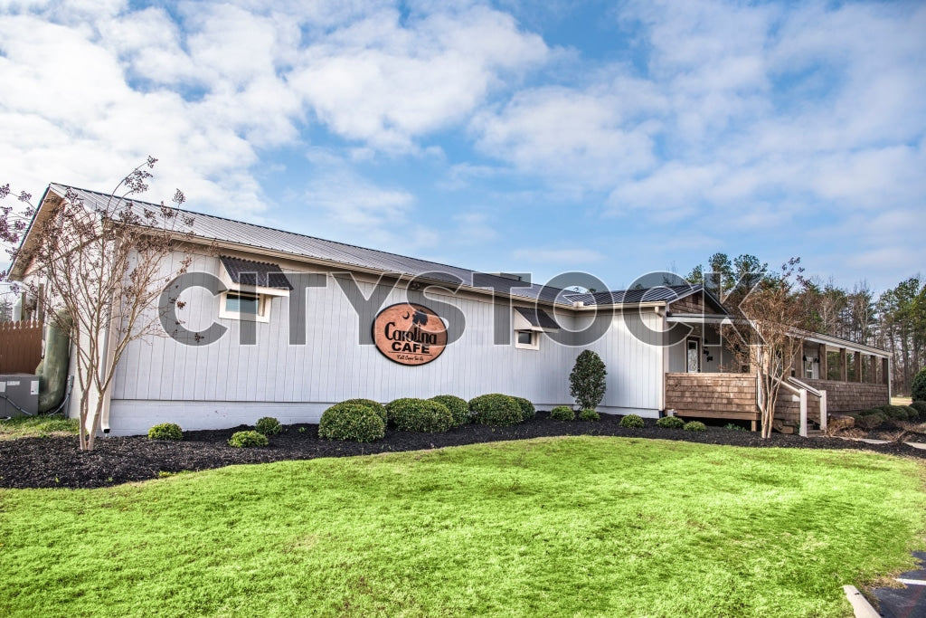 Carolina Cafe exterior in Gaffney with clear blue sky and lush green grass