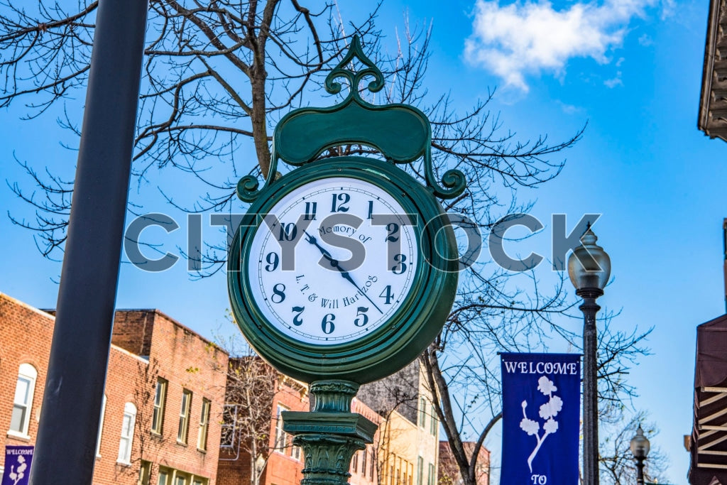 Vintage street clock in Gaffney SC with blue sky and urban backdrop