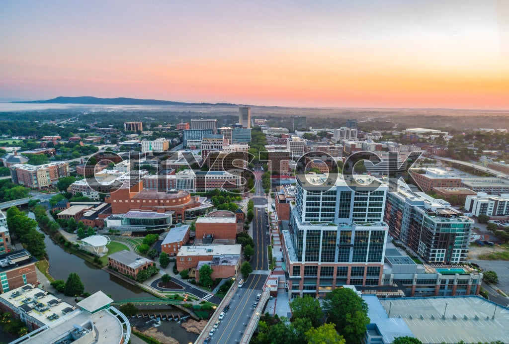 Aerial view of Greenville SC at sunrise showcasing cityscape