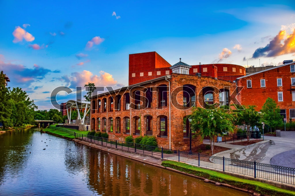 Sunset Reflections on Greenville SC Riverwalk with Brick Buildings