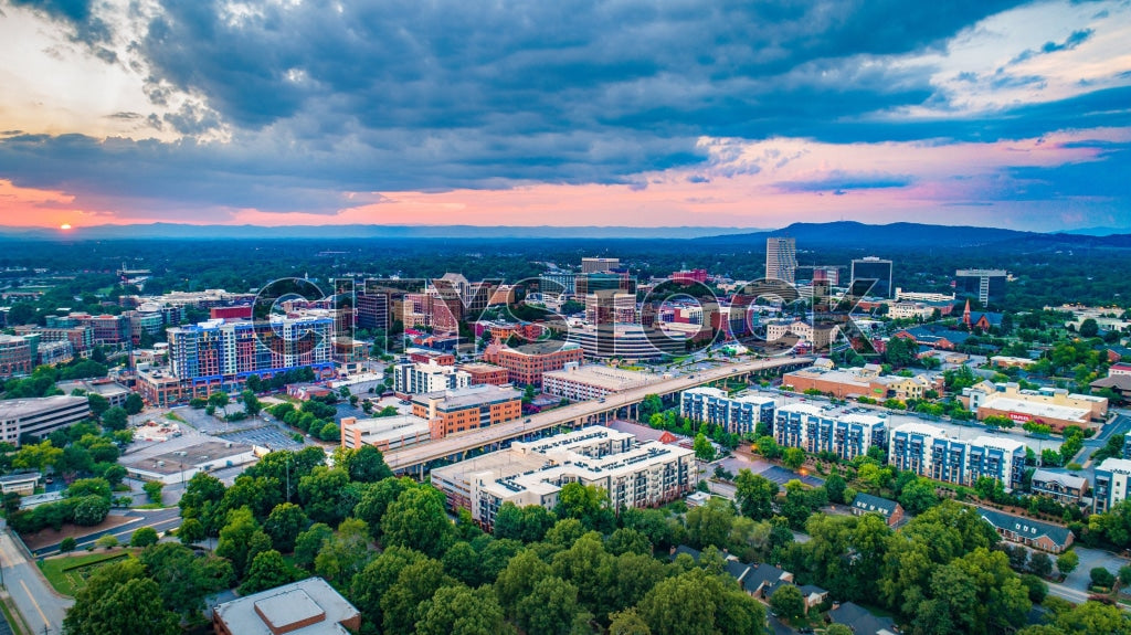 Aerial view of Greenville, SC urban skyline during sunset