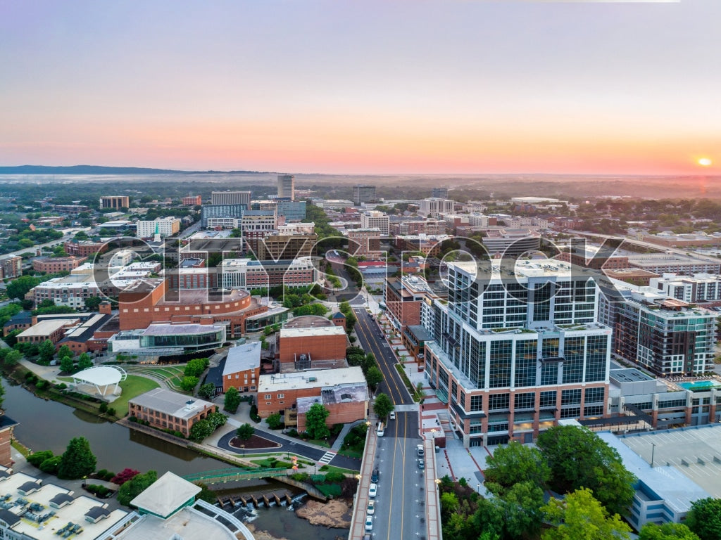 Aerial view of Greenville, SC during sunrise showcasing cityscape