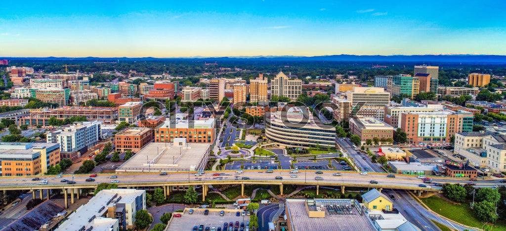 Aerial view of Greenville, SC skyline at sunset highlighting the cityscape