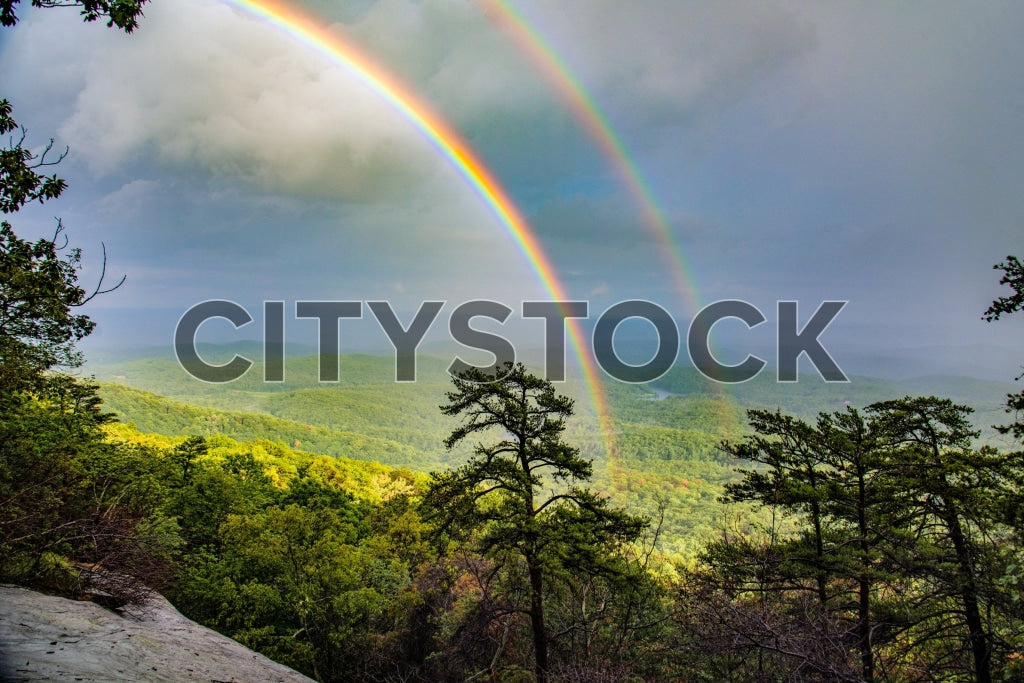Double rainbow over forest and hills in Greenville, SC