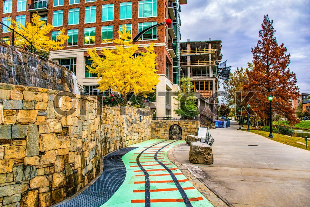 Greenville city walk during autumn with vibrant fall colors and modern architecture