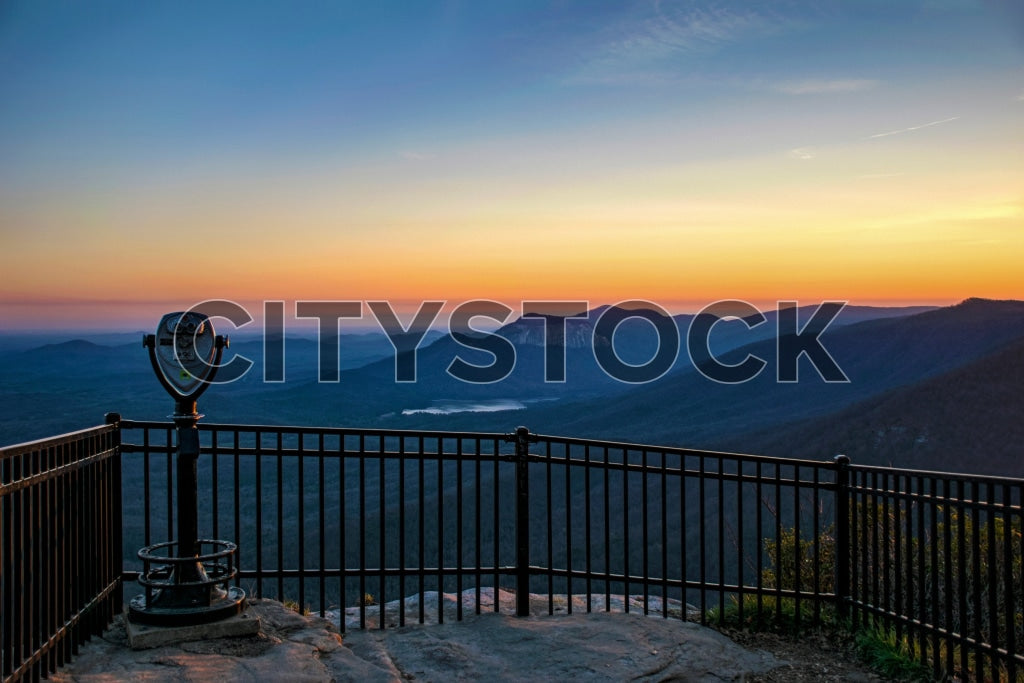 Sunset view over Greenville mountains seen through a telescope