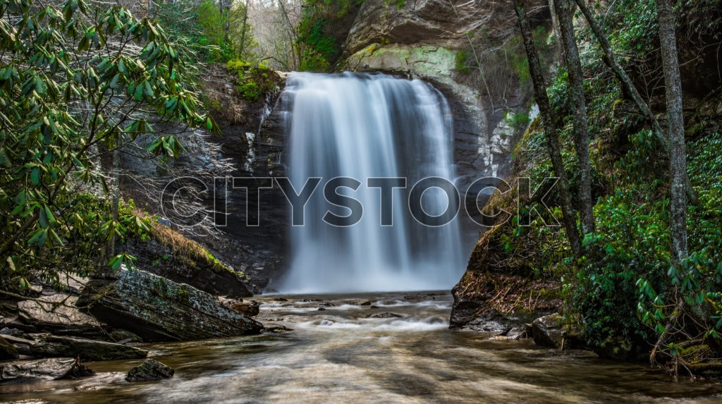 Silky waterfall and lush greenery scene in Greenville, South Carolina