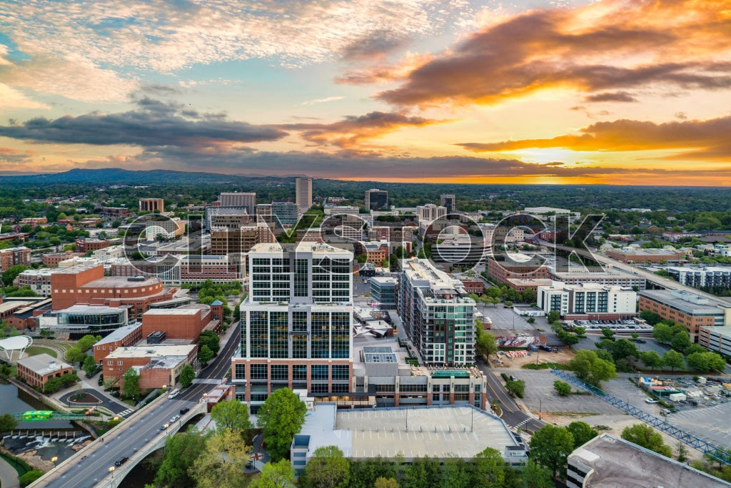 Aerial view of Greenville SC skyline during sunset with vibrant colors